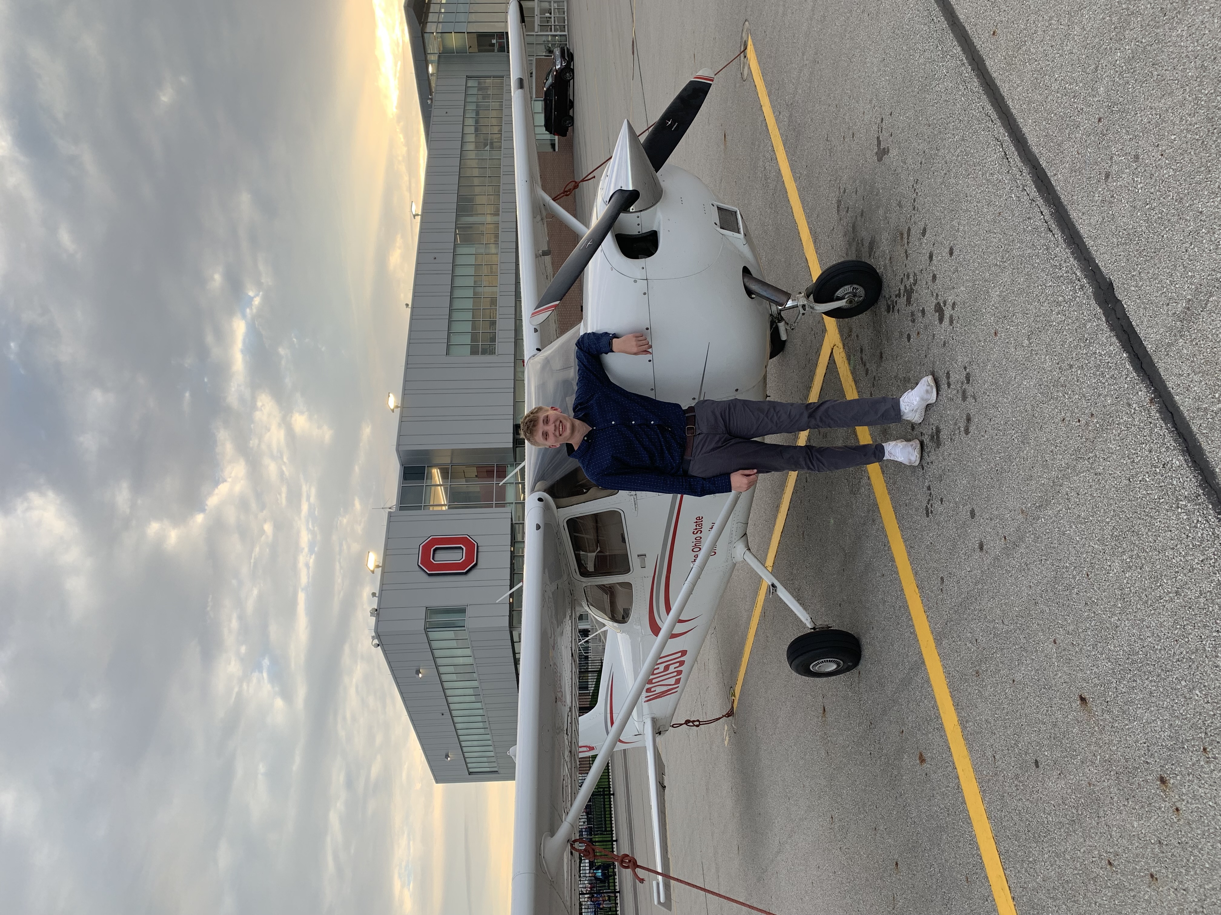 Chris Johnson standing next to a Cessna 172